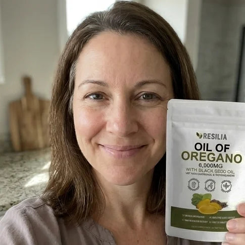 Customer holding the Resilia Oil of Oregano pouch