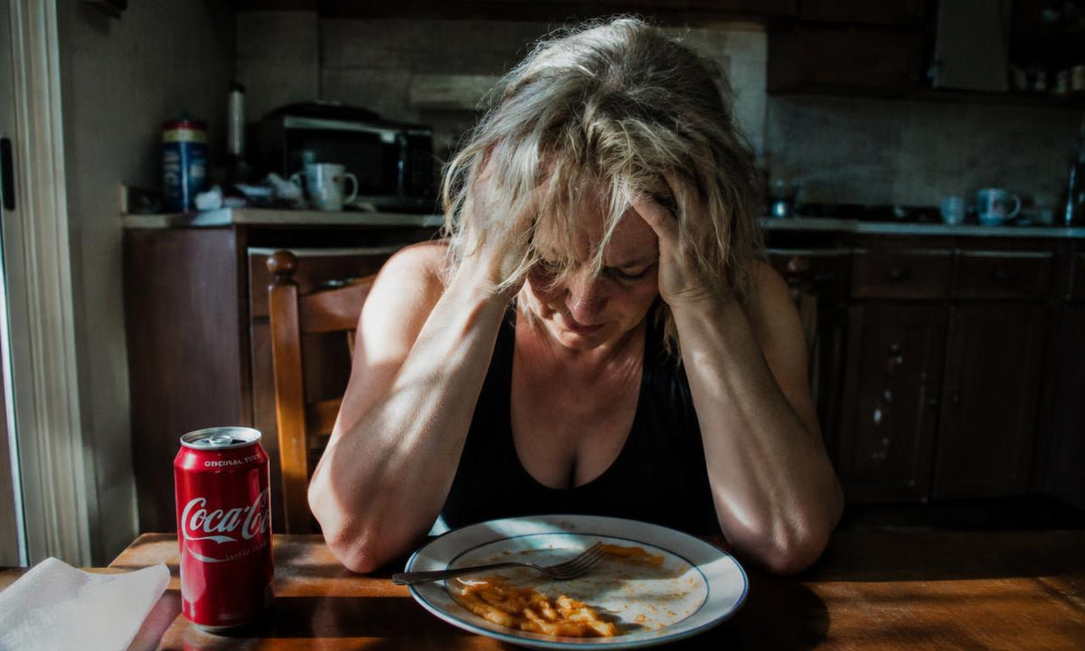 Exhausted woman after lunch
